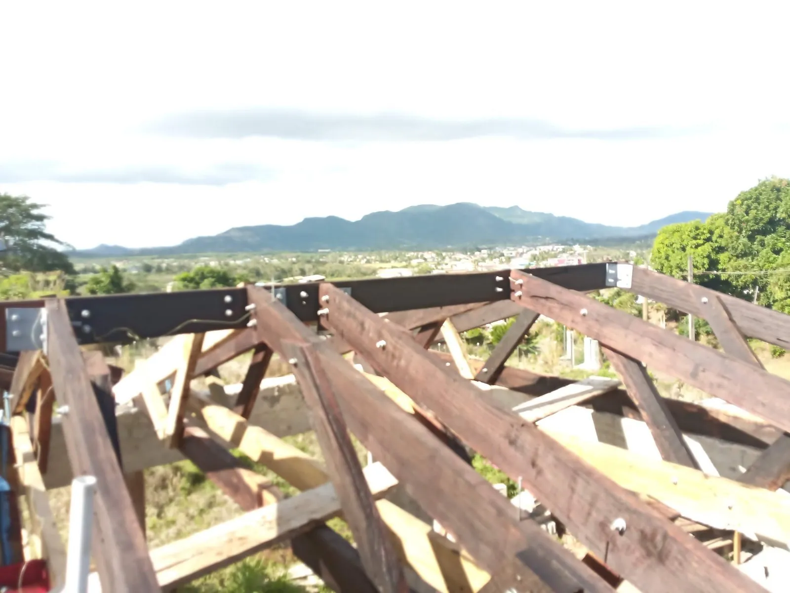 Engineered timber roof trusses on rendered walls
